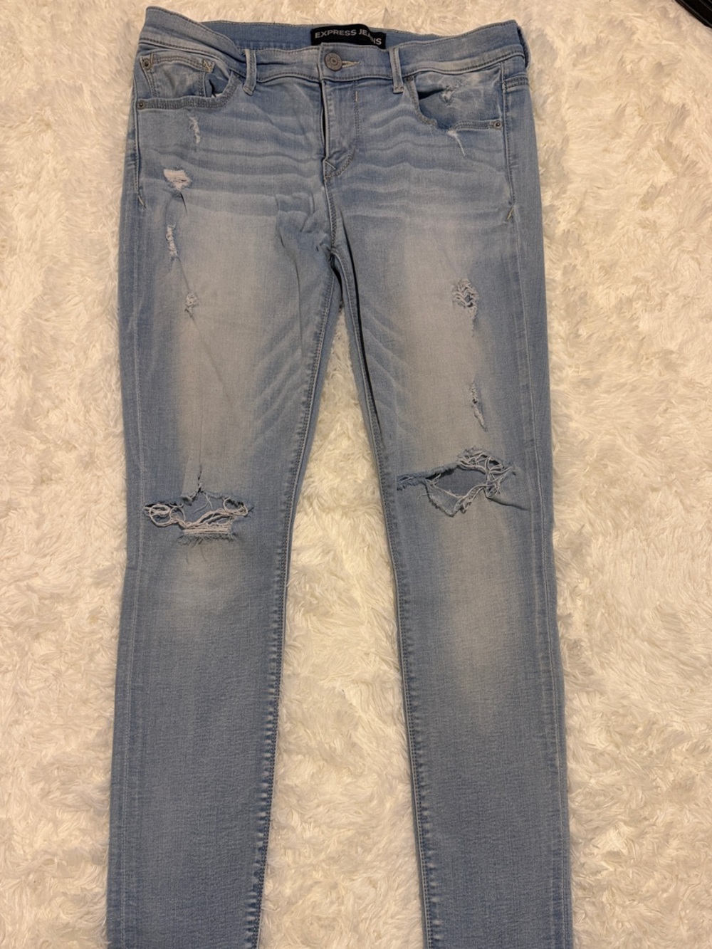 Express Light Blue Distressed Skinny Jeans